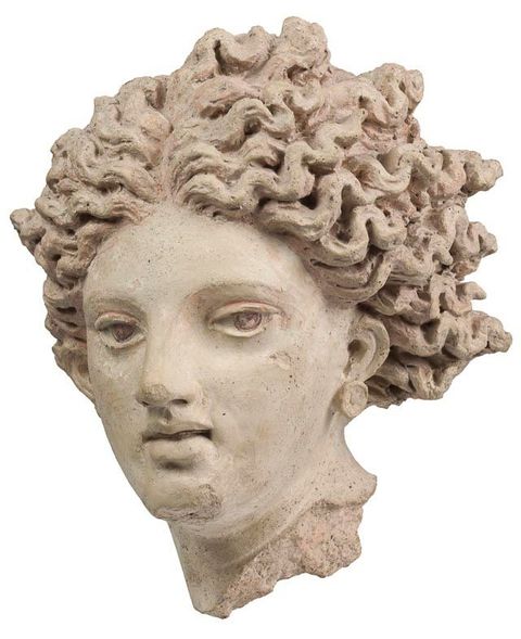 Fig. 1, Testa femminile in terracotta modellata a mano identificata con Leucotea dal frontone anteriore del Tempio A, Pyrgi (Santa Severa), 340-330 a. C., Museo Nazionale Etrusco di Villa Giulia, Roma