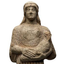 Statuetta votiva di donna con bambino in braccio